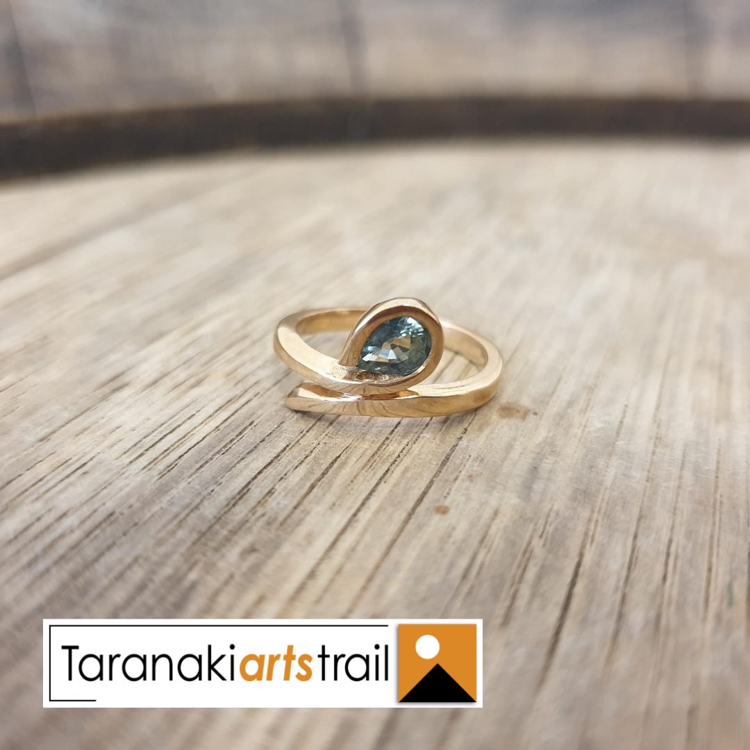 Gold teal sapphire ring