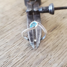 Silver Wave Topaz Design