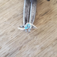 Silver Wave Topaz Design