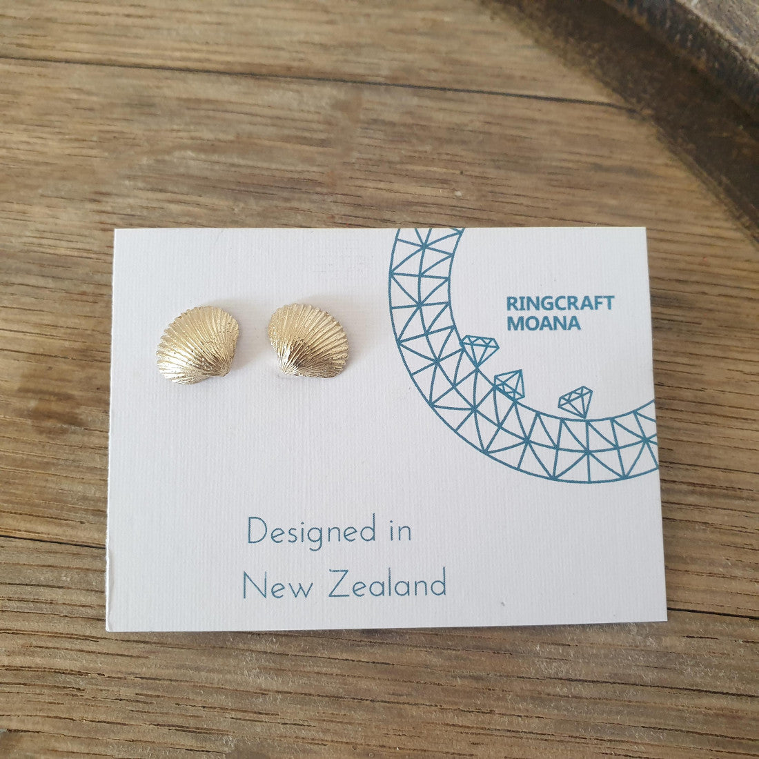golden shell earrings